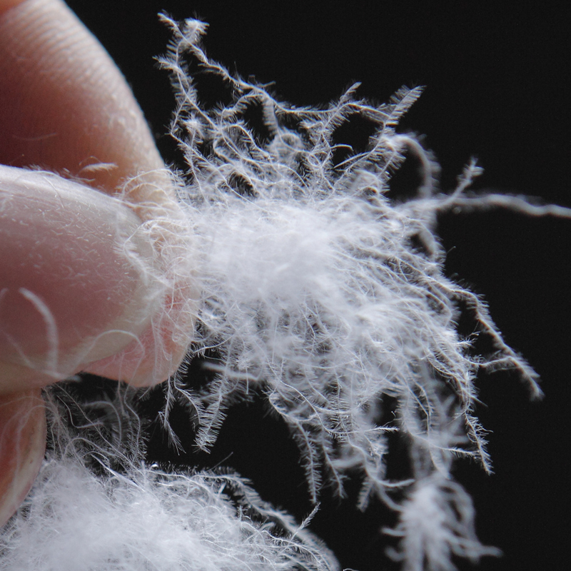 羽绒厂家浅析出绒的原因和解决方法